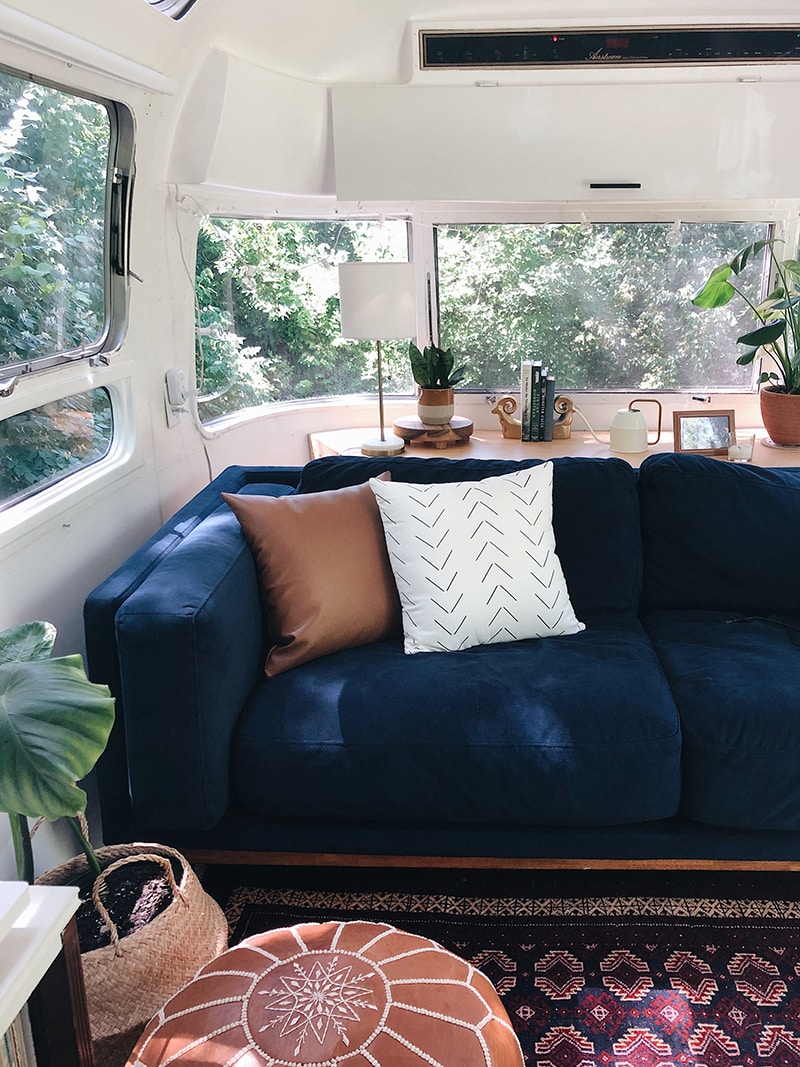 Modern Blue suede sofa inside Airstream from @provencher_adventure