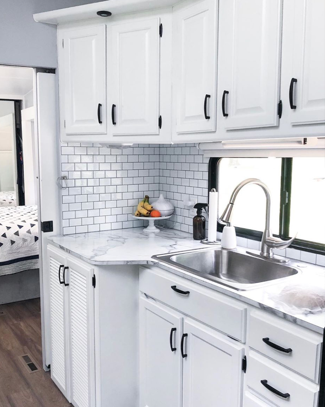 White RV Kitchen Interior from @fifthwheelfarmhouse