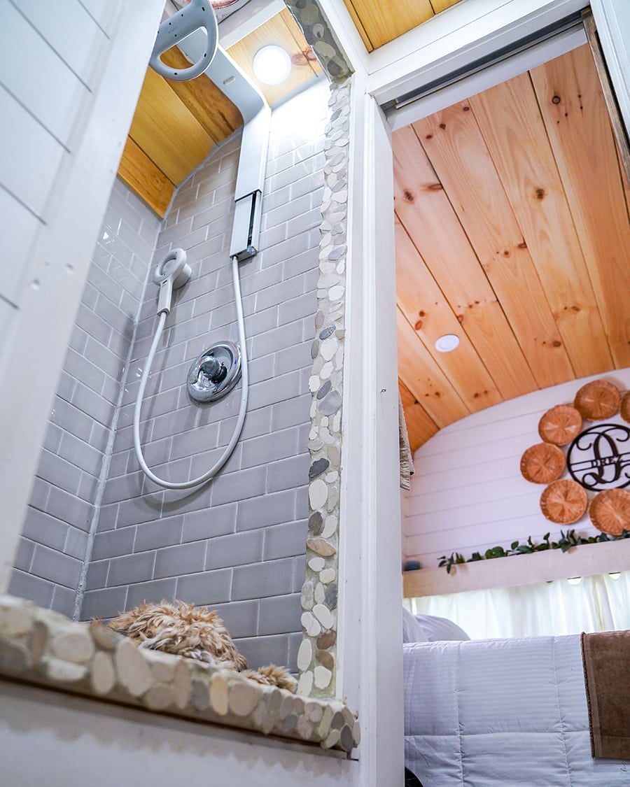 Converted school bus with nebia spa shower @happyhomebodies