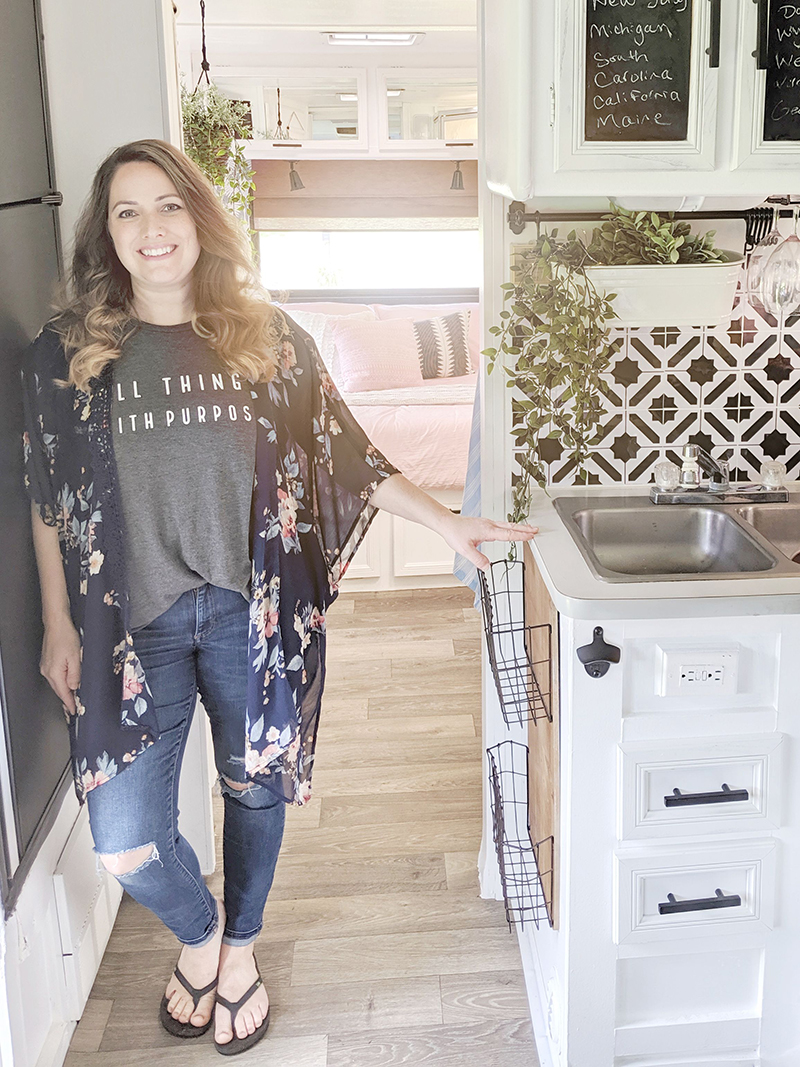 Sarah Lemp of All Things with Purpose inside an RV she renovated