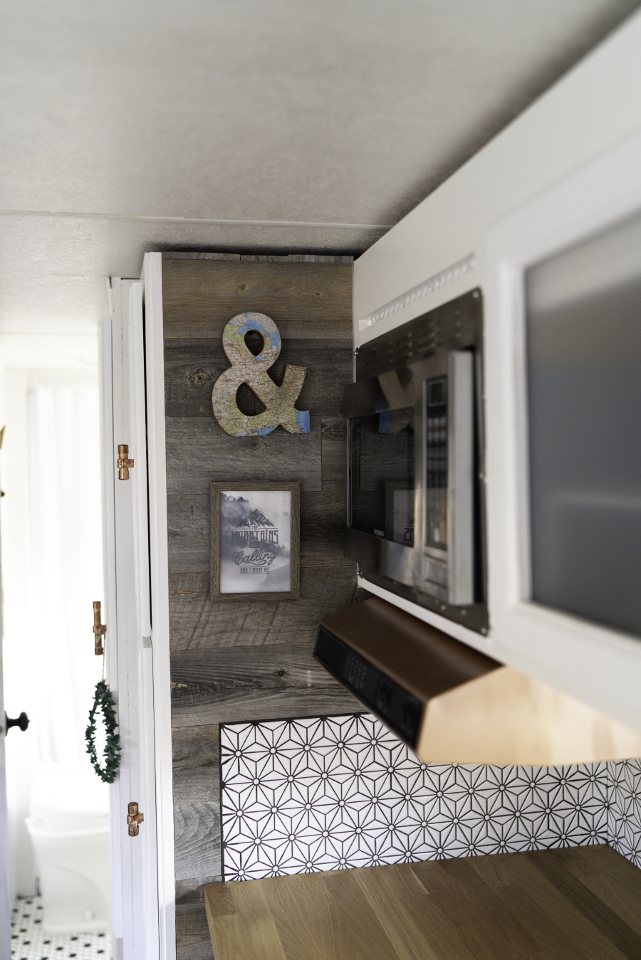 Stickwood planked walls inside camper