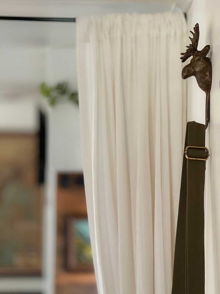 moose hook with purse hanging from it