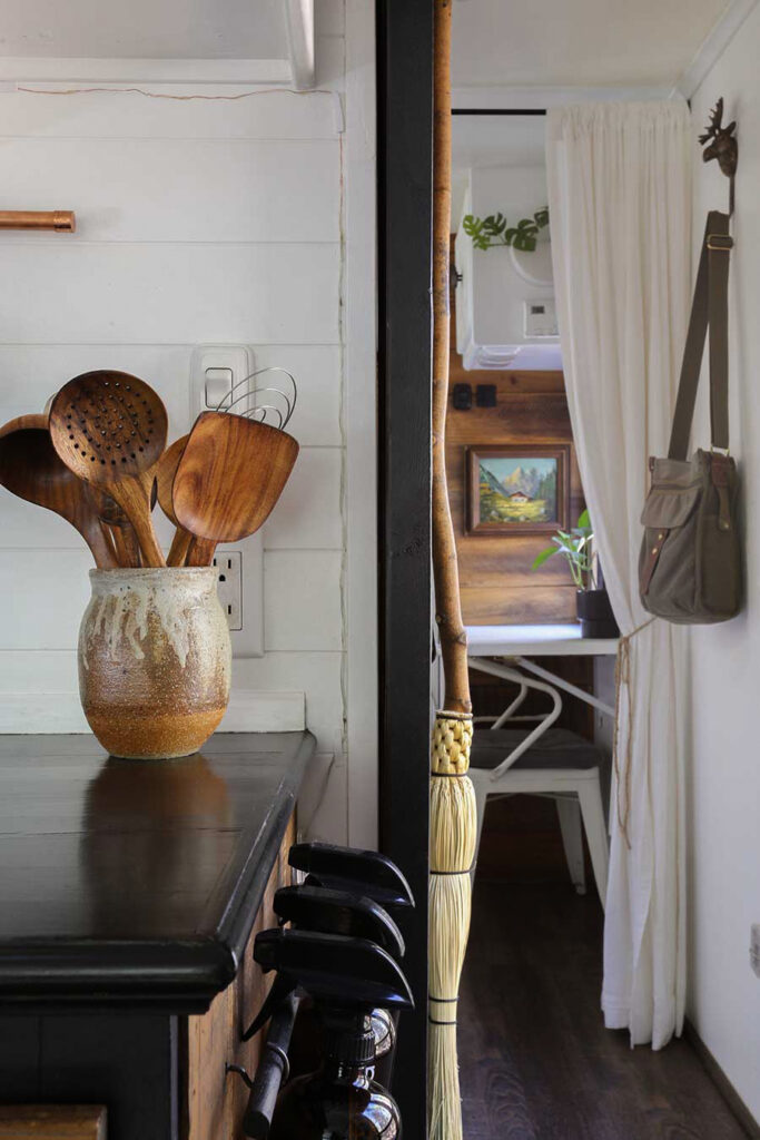 ceramic pot with wooden utensils