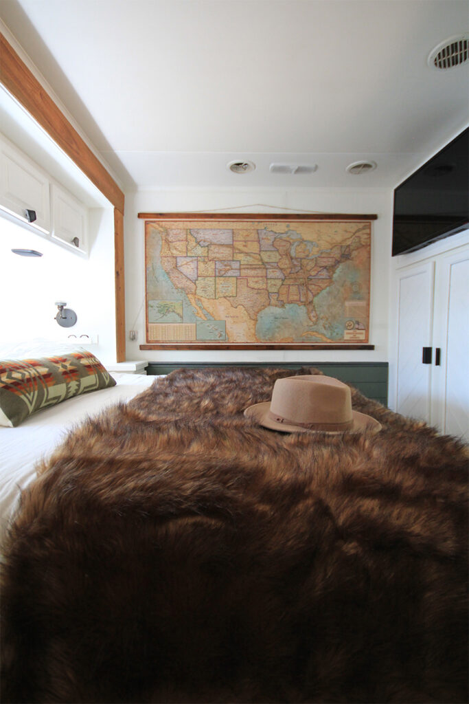RV bedroom with vintage map