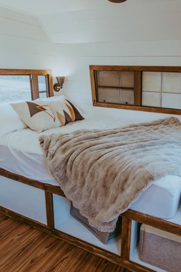 Tour this family-friendly camper remodel that includes a DIY epoxy shower
