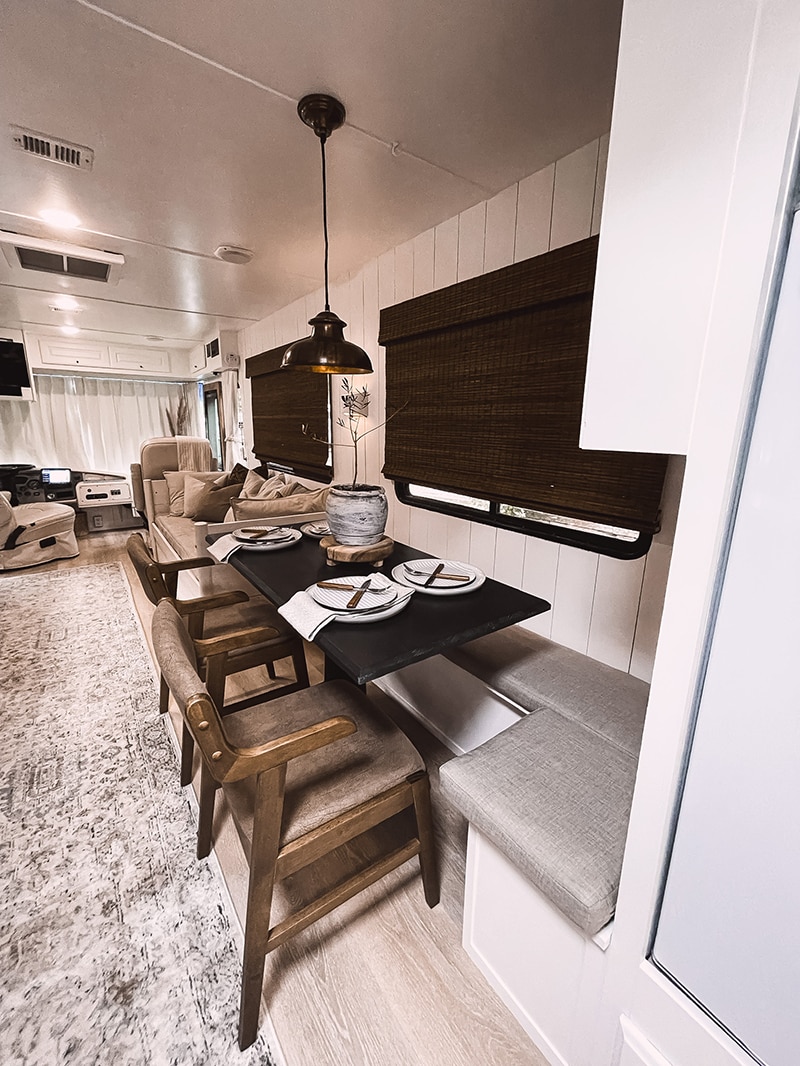 You’ll want to cozy up to the earthy hues and organic textures in this renovated Monaco Motorhome