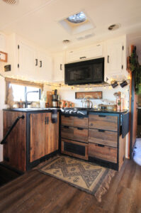 RV kitchen with reclaimed cabinets