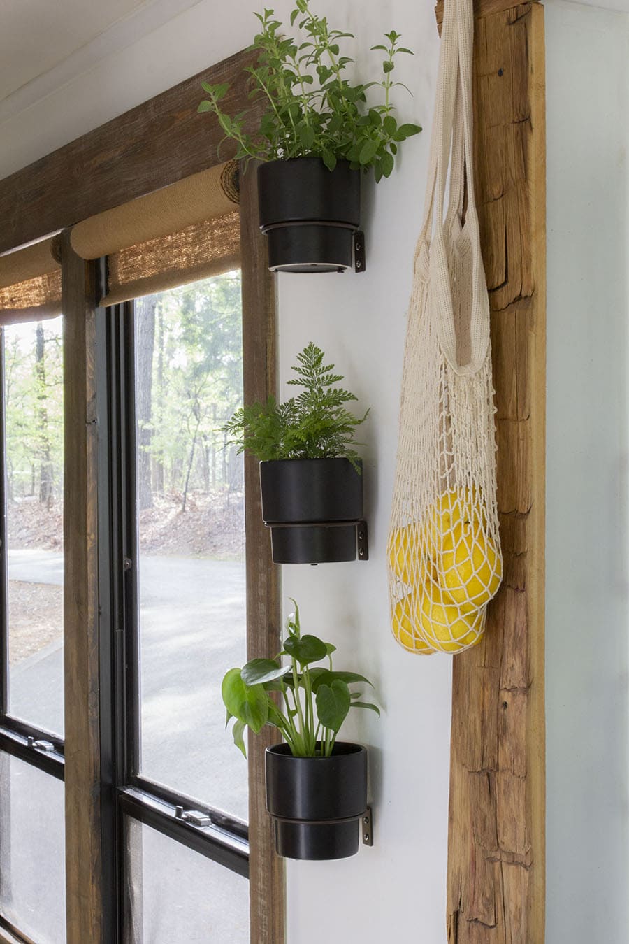 diy burlap roller shades rolled up on RV hallway windows