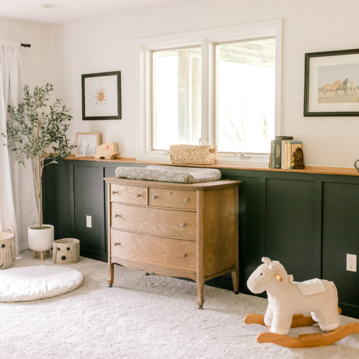 nursery with green accent wall
