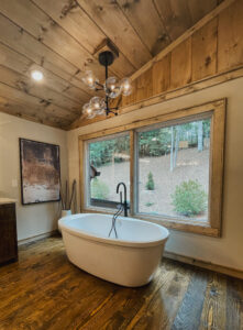 rustic modern bathroom in mountain home